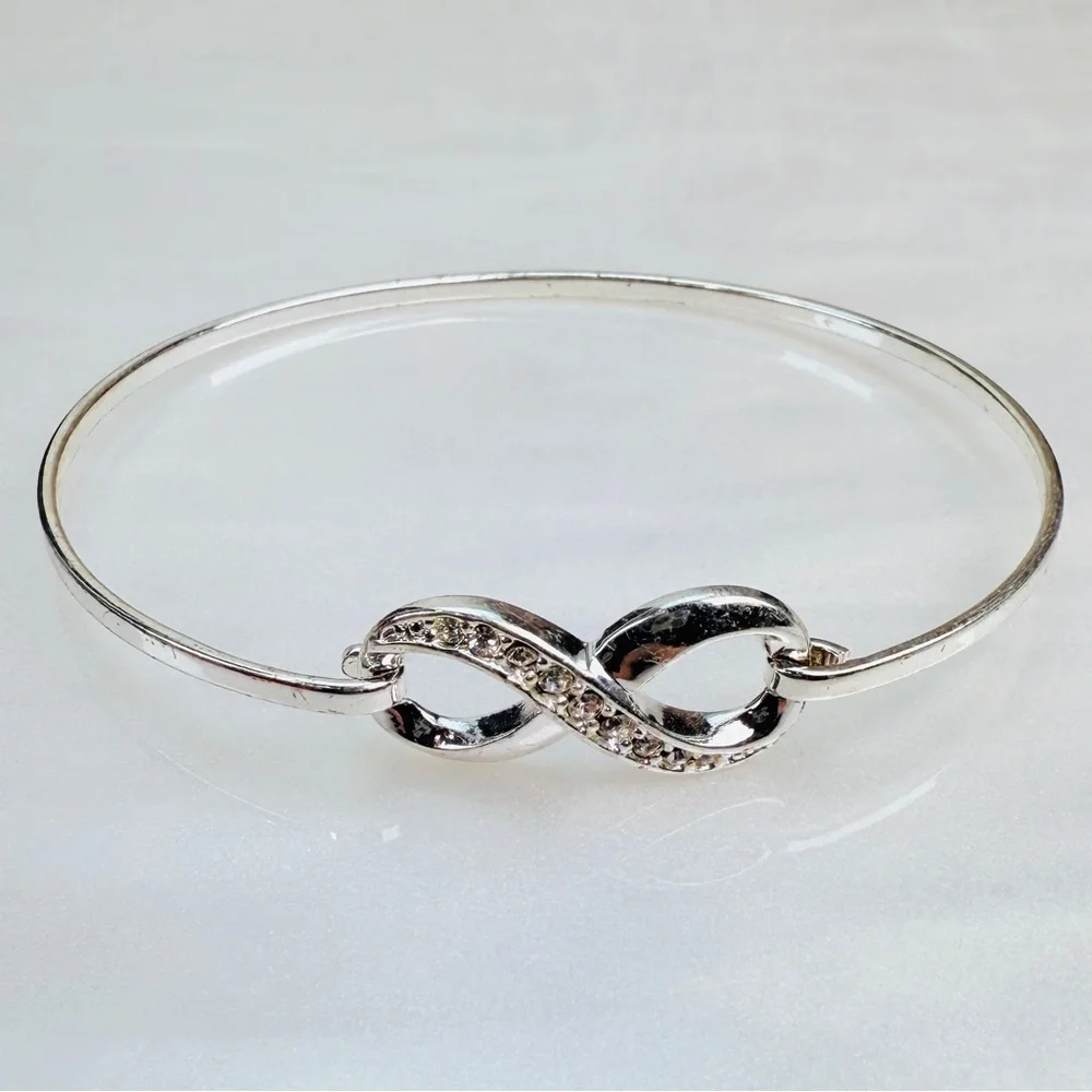 Silvertone bling accent Infinity Bracelet - Picture 9 of 11